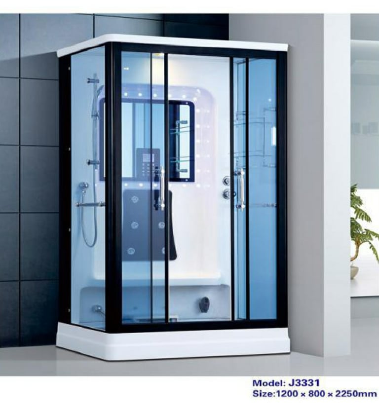 a modern shower room with a glass shower