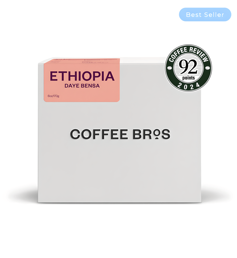 Coffee Bros Ethiopia Daye Bensa roasted coffee beans in a white box with a 92-point award.