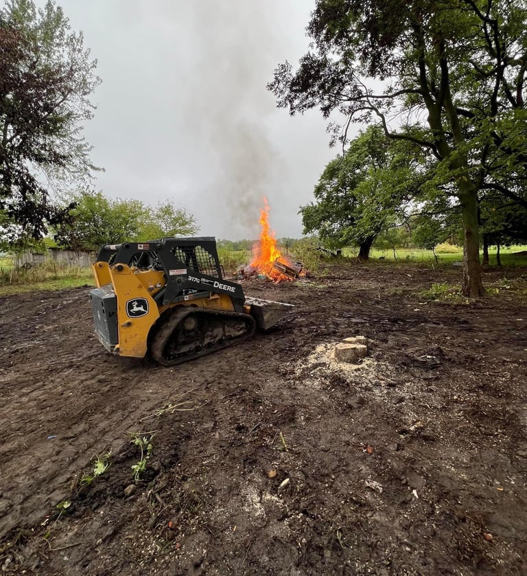 skid-steer-clearing-land-in-hannibal-mo