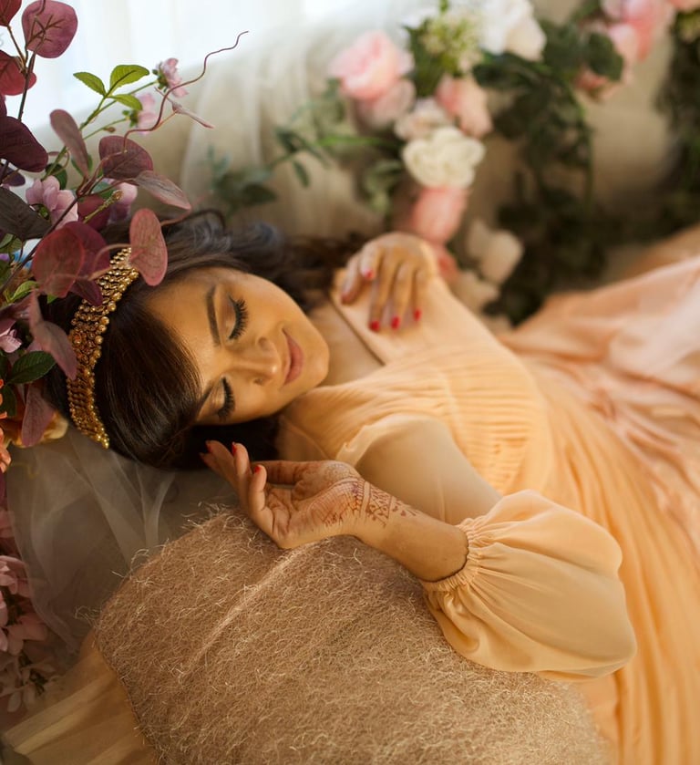 a woman in a dress and a flower crown