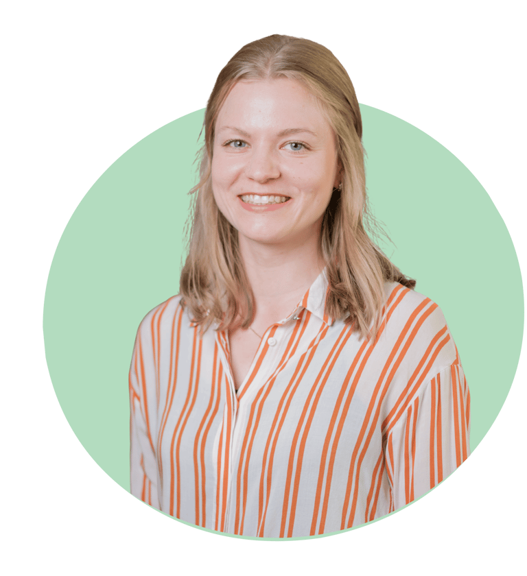 a woman with blonde hair and a striped shirt