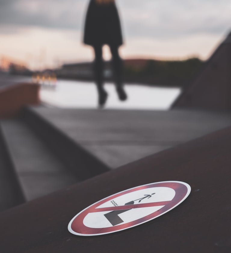 a jumping in the air while a no jumping sign is displayed