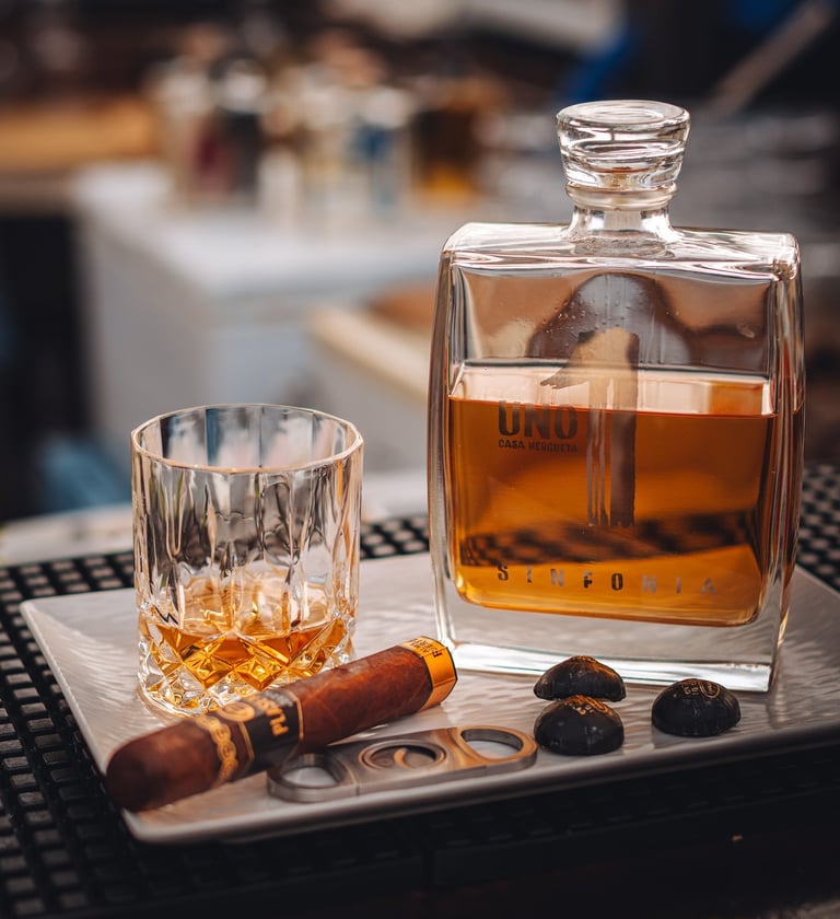 a glass of luxury Uno tequila Sinfonia and cigars - extra añejo