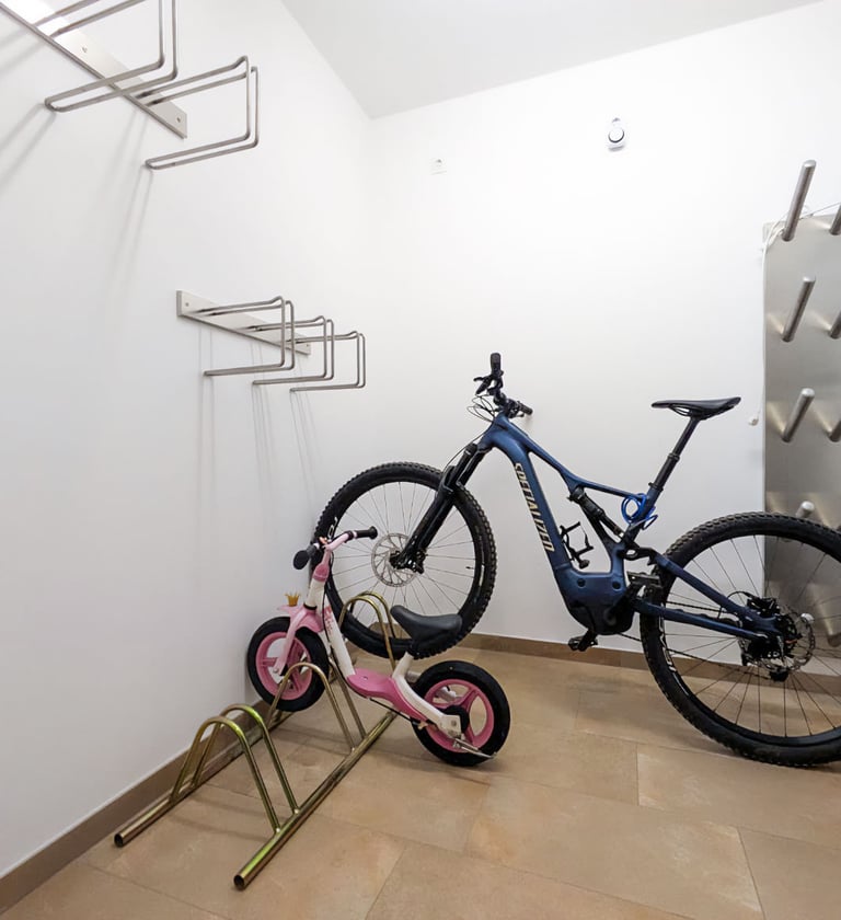 a bicycle is parked in a room with a bike