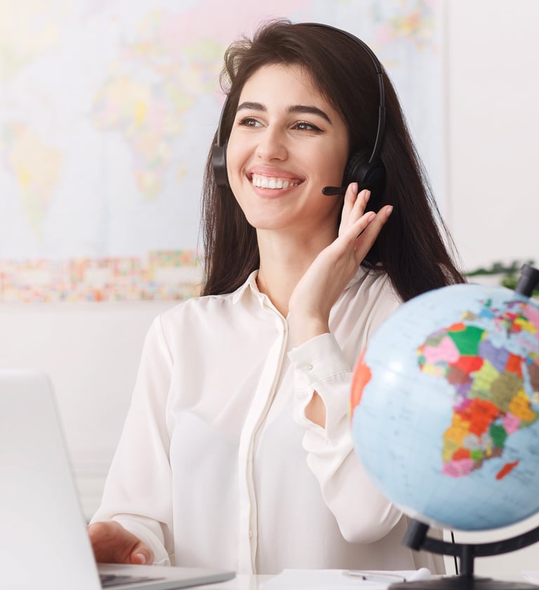a woman in a white shirt and a globe providing customer services