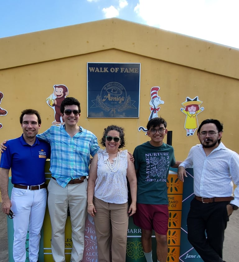 A group of people taking a picture side by side