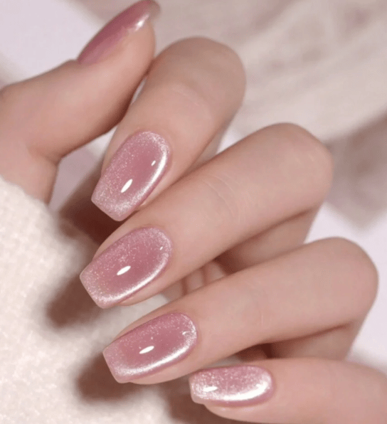 Pink resin stone press-on nails for a woodland fairy floral baby shower look