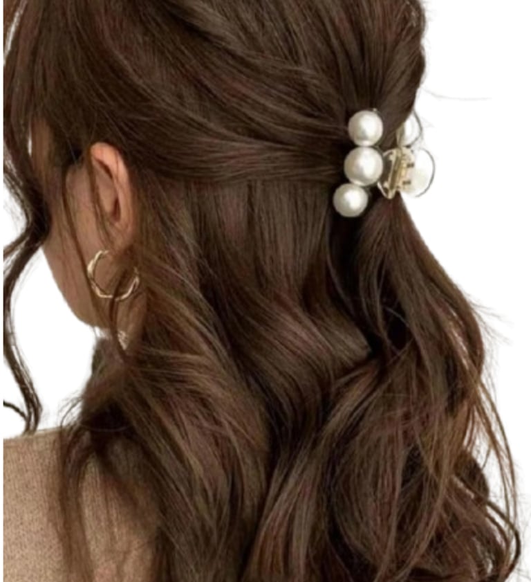 Elegant faux pearl hair claw styled with fall outfit.