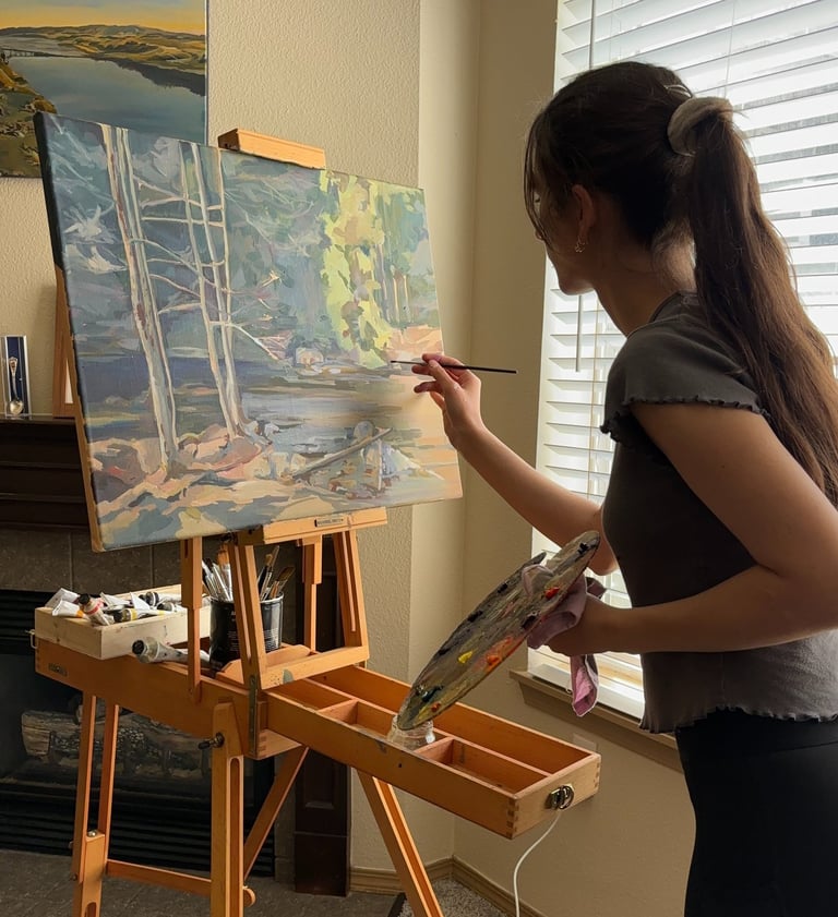 Angela Moiseieva at work on Nature’s Whisper 18 × 24 inches, an original forest oil painting