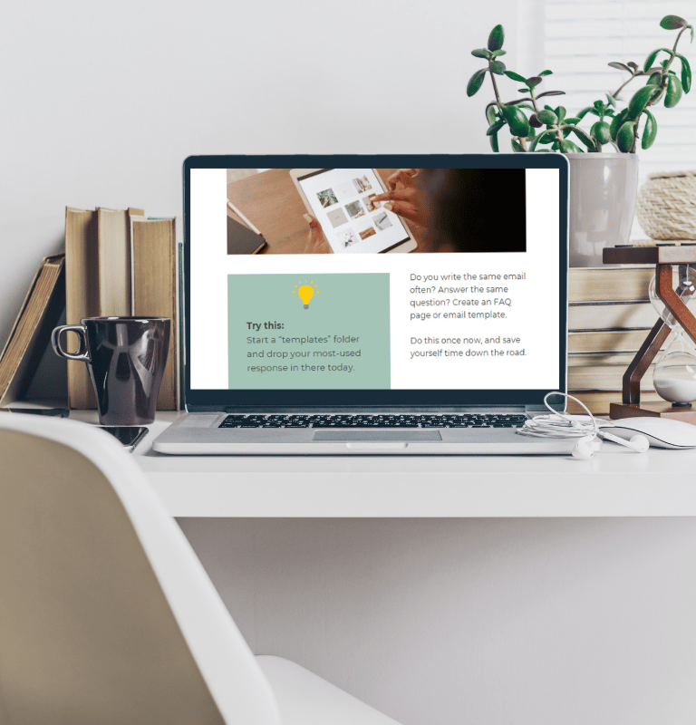 a laptop computer sitting on a desk with the time audit freebie on the screen