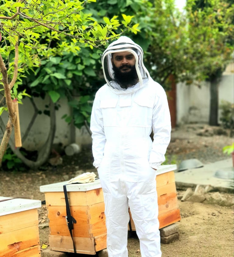 Beekeeper with Hives