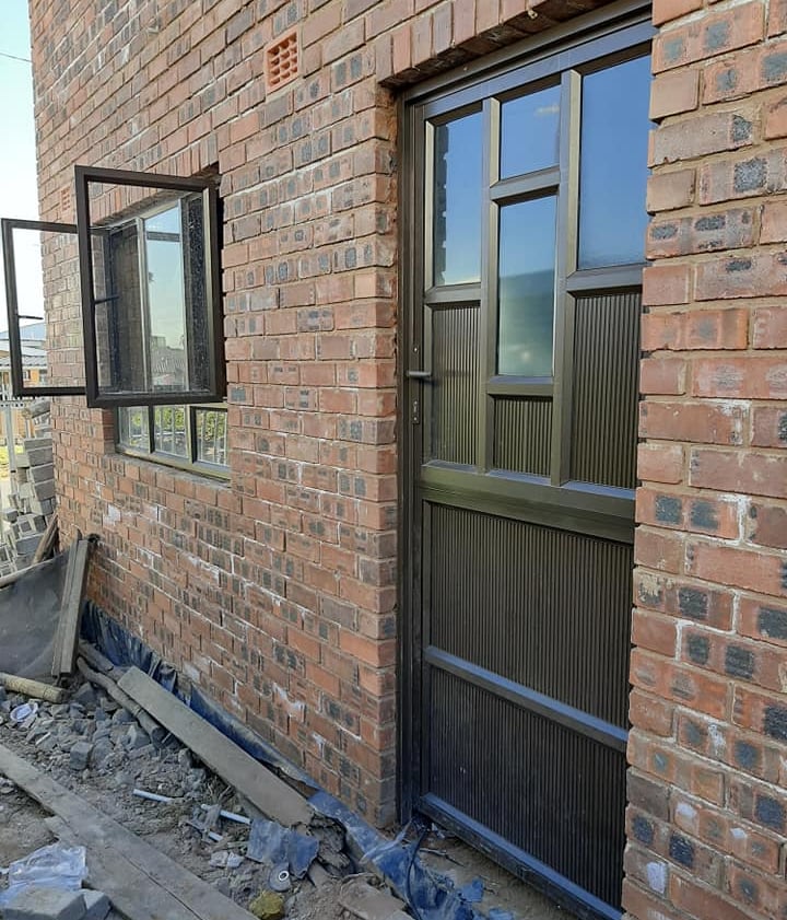bronze stable door and kitchen window installation in durban