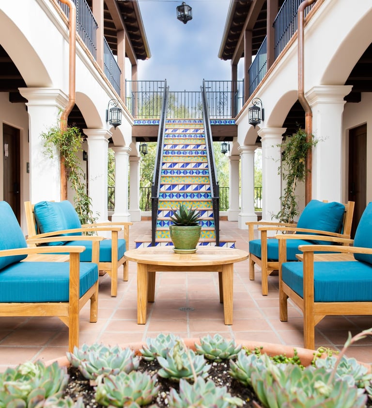 Outdoor courtyard at Playa Inn in Santa Barbara, California, a romantic getaway for couples