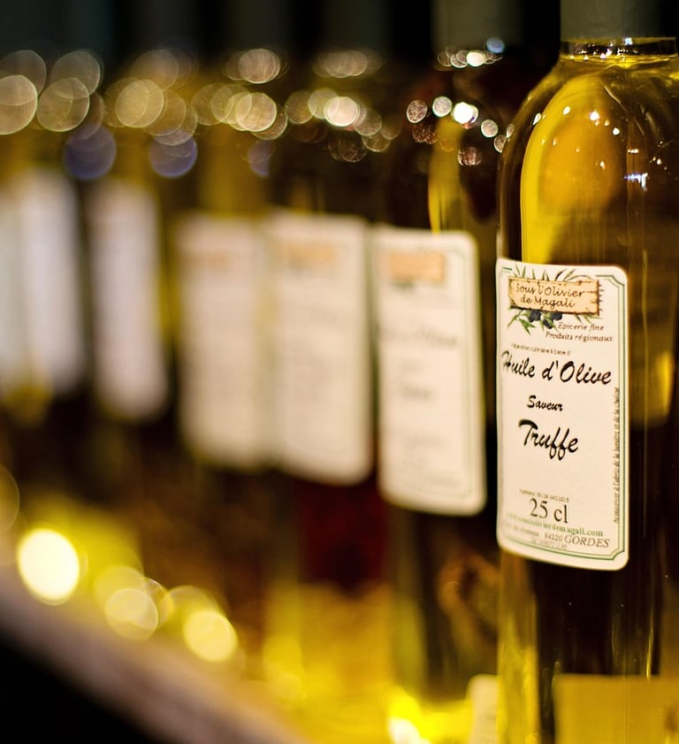 Bottles of olive oil for tasting at a shop in Ojai, California with warm golden lighting