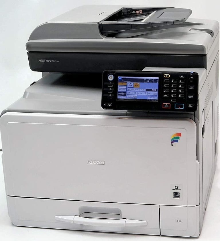 a printer machine with a printer on top of it