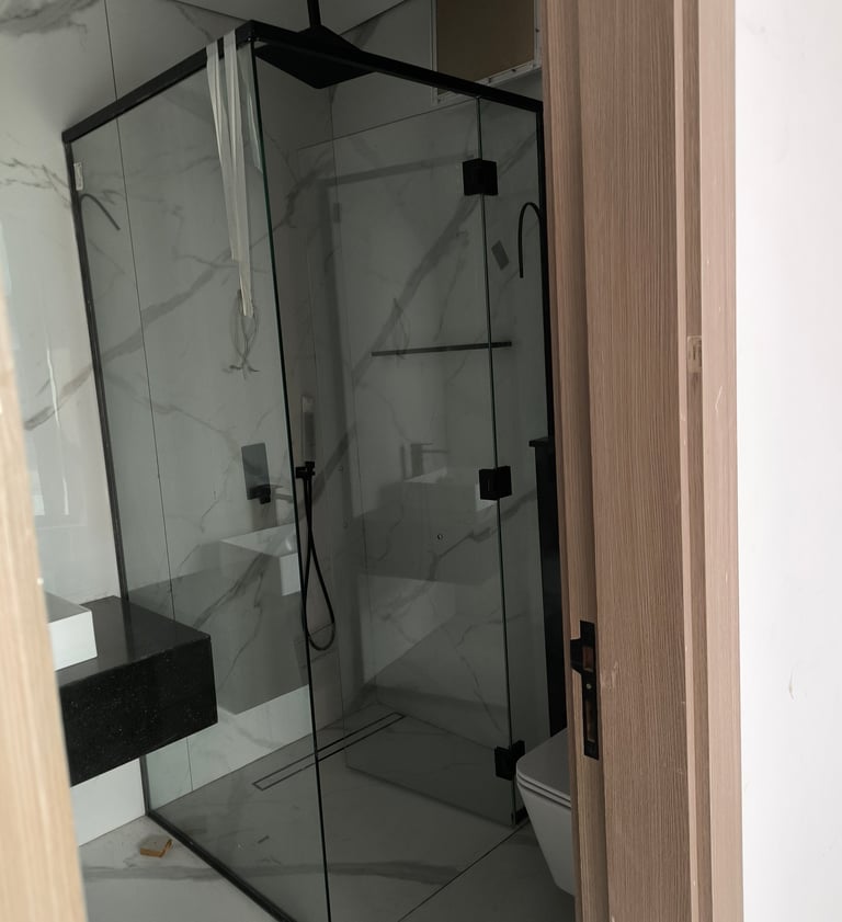 10mm tempered glass shower enclosure with waterproof seals and chrome hinges.