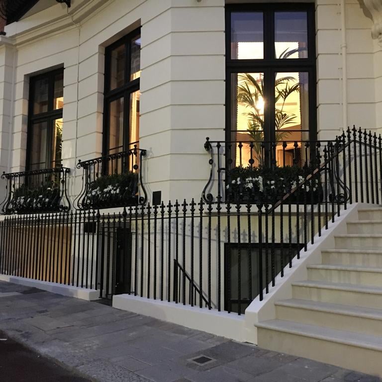Elegant Victorian townhouse in London featuring bespoke wrought iron railings and balconettes by Ken