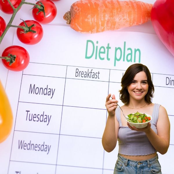 a woman holding a bowl of food and a salad