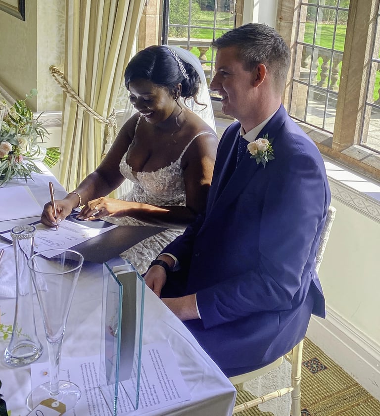 Warm wedding ceremony led by celebrant David Allbutt in Manchester, creating a personal and bespoke moment for the couple.