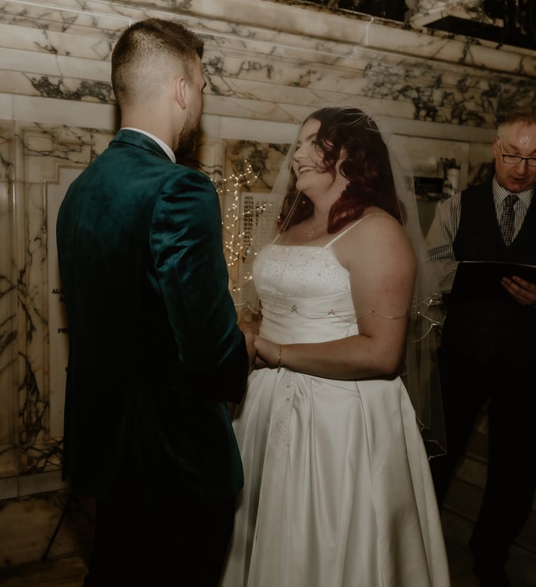 Couple Saying Vows At Their Wedding Ceremony