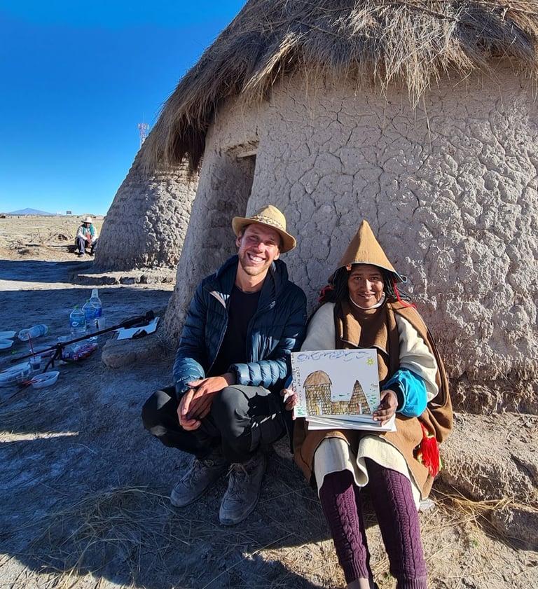 Monsieur rêve et une femme Chipayas en tenue traditionnelle avec le dessin de son rêve