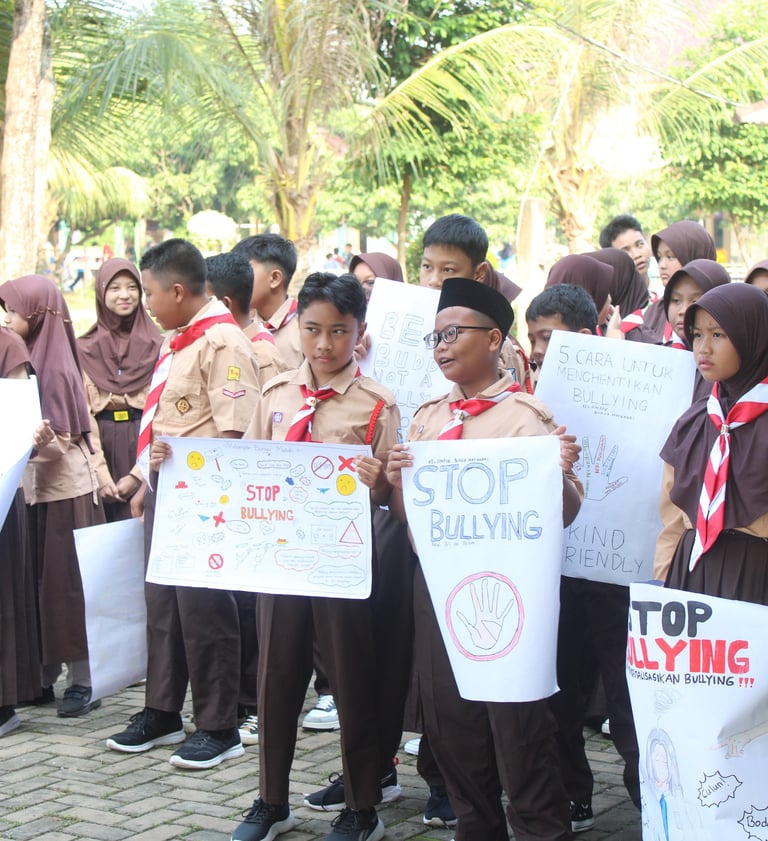 a group of people holding signs that read stop bullying