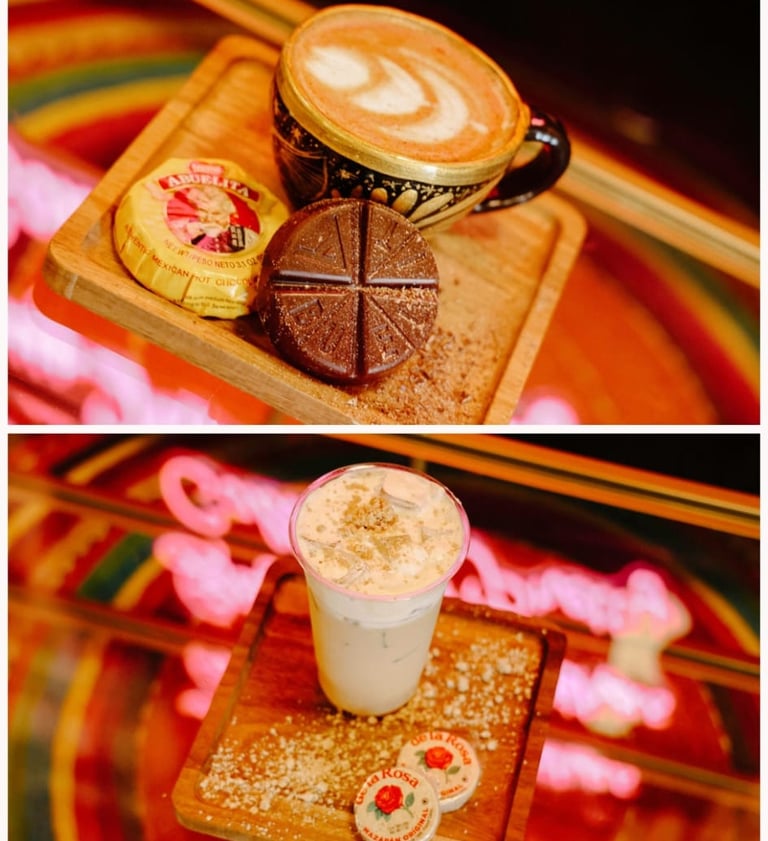 Artisan Mexican latte served with Abuelita chocolate and Mazapan peanut candy on a wooden tray.