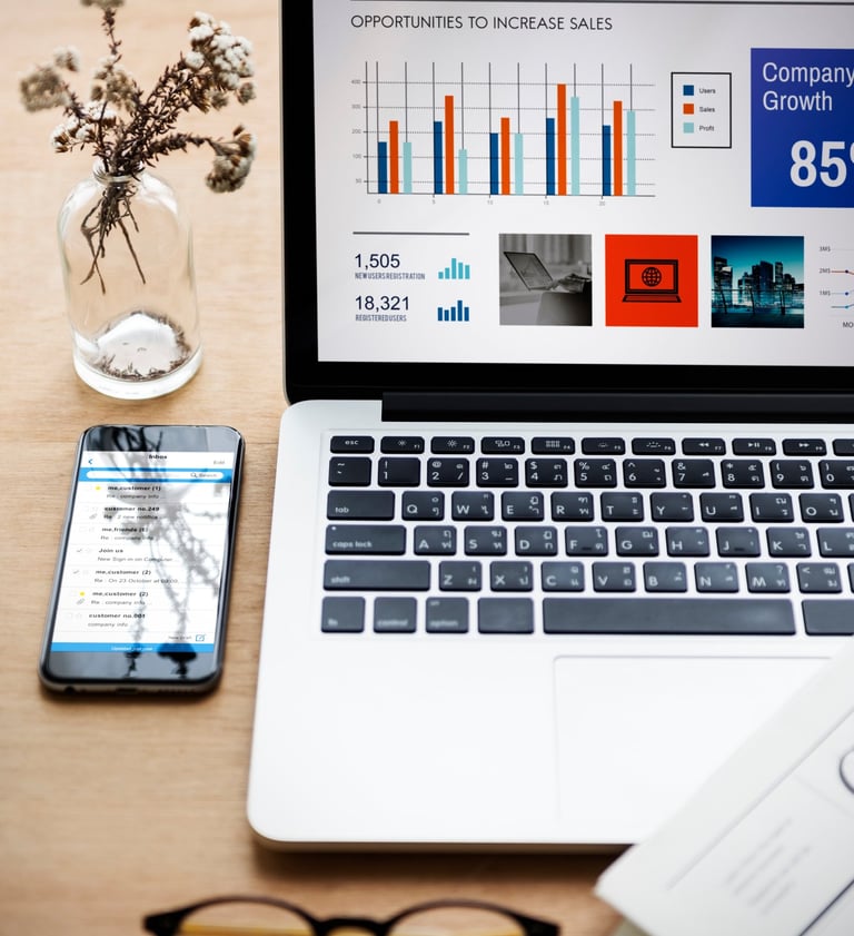 Colorful data dashboard on a laptop in a sleek office setting