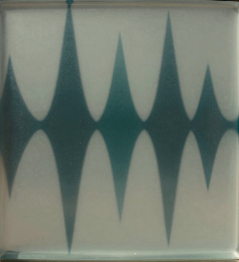 Abstract cinematic photography of light refracting through a heavy block of milky glass. The light creates distorted prisms in muted sage grey and deep teal, mimicking the visual representation of invisible frequency waves.