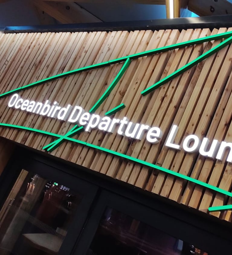 Completed signage installation at Oceanbird Departure Lounge – example of certified, high-compliance