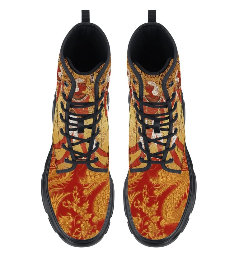 a pair of shoes with a dragon on the side
