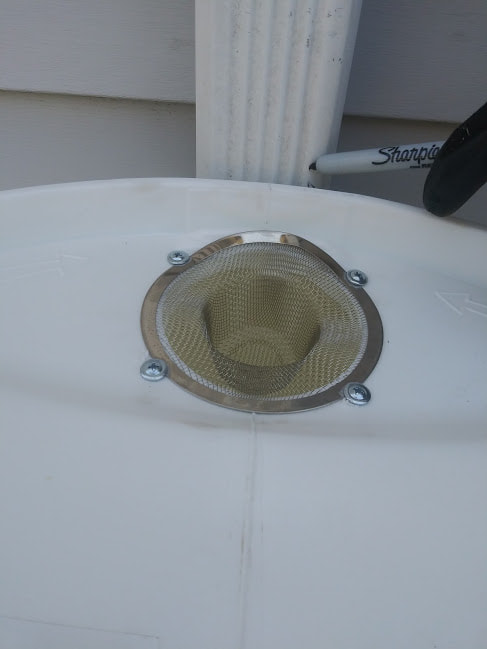 Measuring where to cut a downspout to install a rain barrel