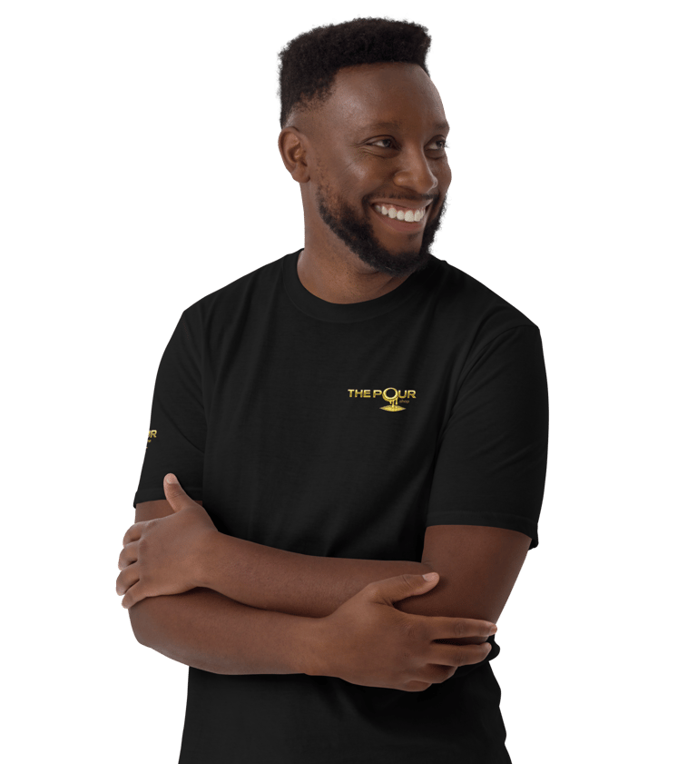 man wearing the pour shop logo black t shirt portrait