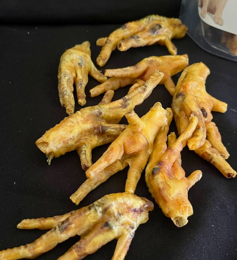 a bunch of chicken wings that are sitting on a table