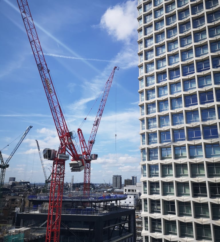Building under construction with cranes