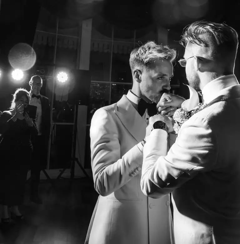 LGBTQ+ wedding couple enjoying their first dance
