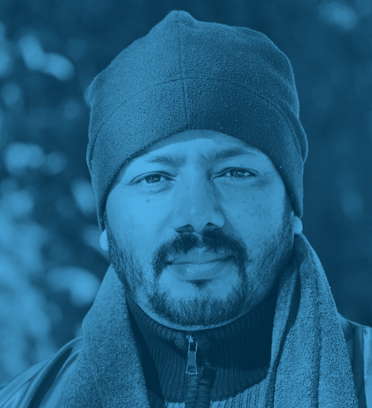 a man with a beard and a hat on