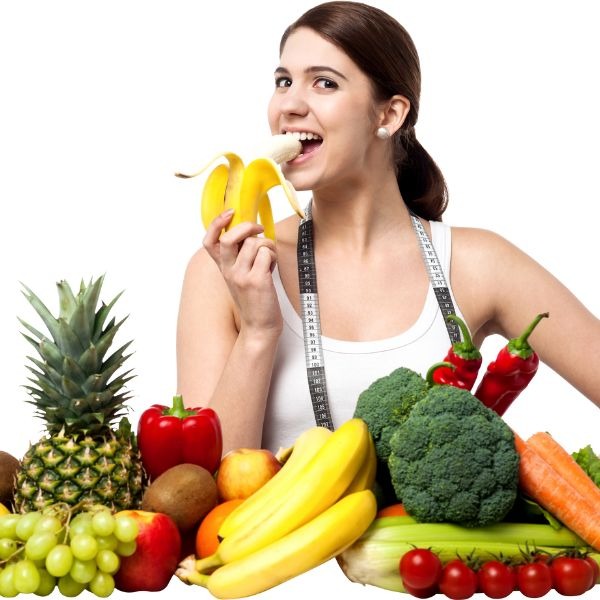 woman eating colorful fruits