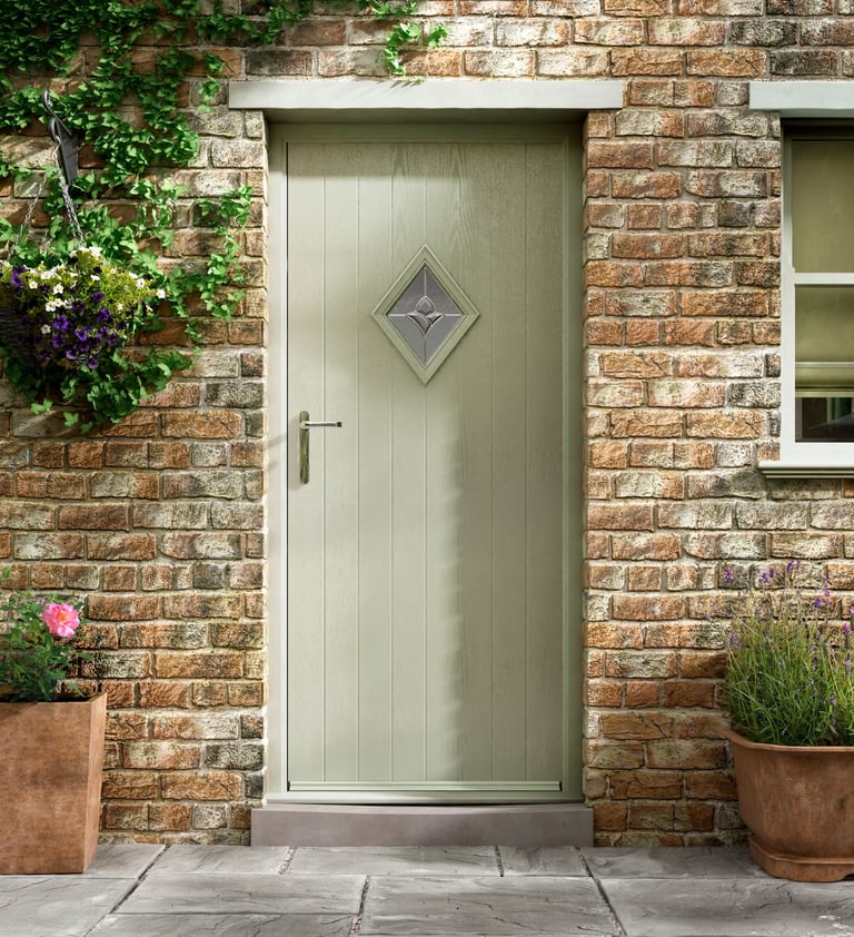 a short diamond composite door installed on brickwork