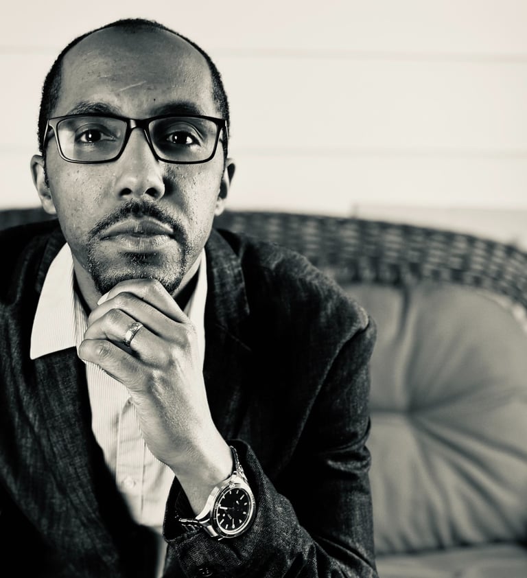 Portrait of J Allen Phelps, author of "The Girl No Boy Could love," exuding creativity and warmth.