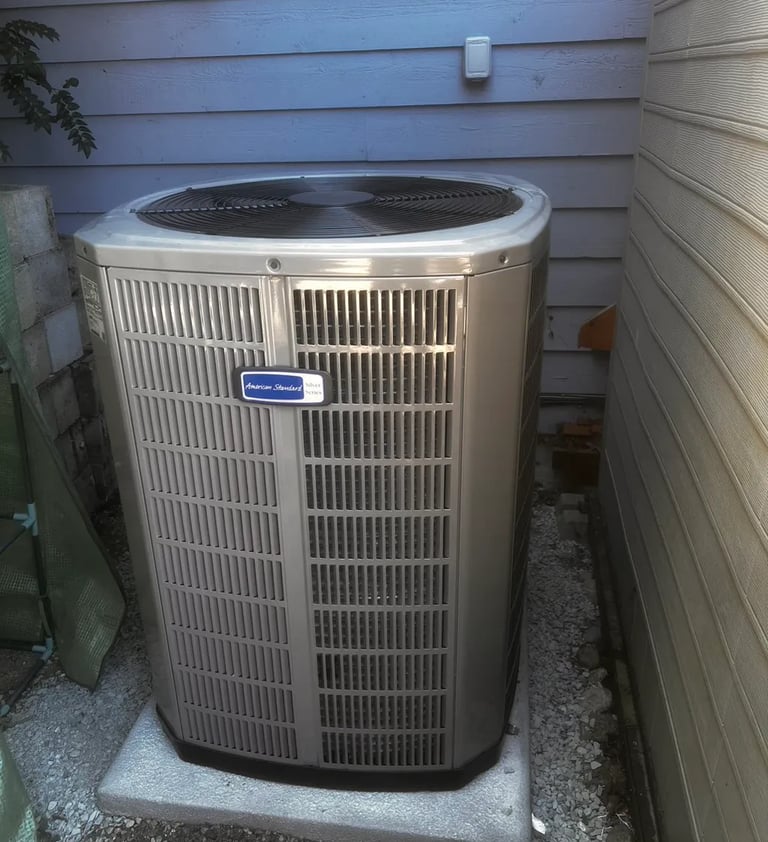 New Heat Pump American Standard installed outdoor nice and tidy area