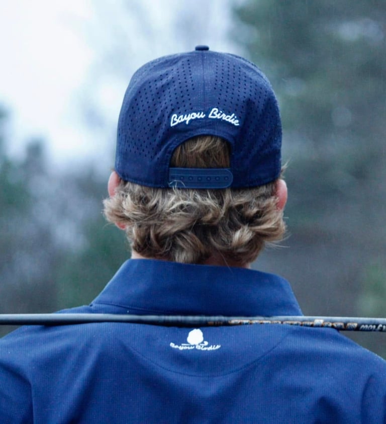 Navy Bayou Birdie Hat on Golfer