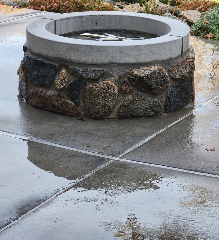 natural stone gas firepit on patio