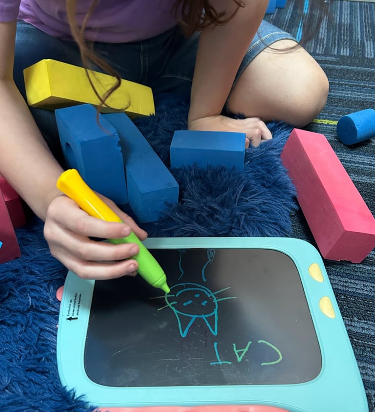 Child working on pencil grip and hand strength during OT in Tempe AZ