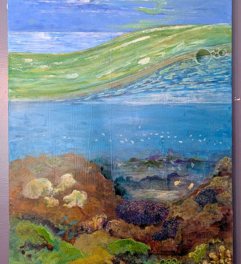 A color rich acrylic painting of coral reef life under a cloudy bright sky and saltwater waves by Kathy LaFollett.