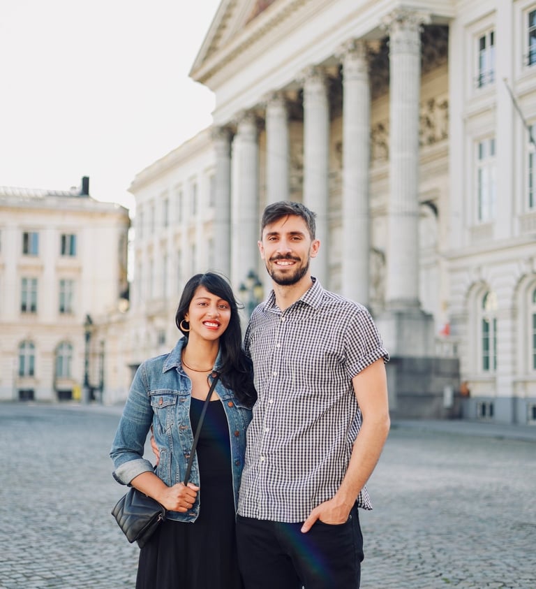 Venture Along founders posed outdoors in a European city