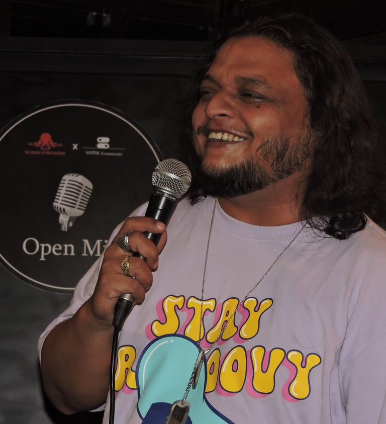 Sudhanshu Marwade, a stand up comedian, performs at an Orange Octopus event in 2024