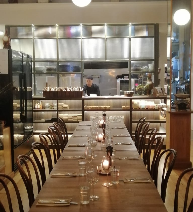 a long table with candles and candles on it