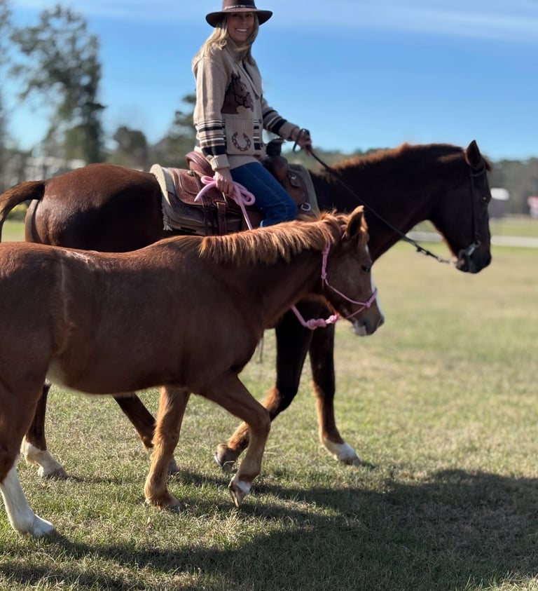 Pony Party owner, Beth, exercising Snickers