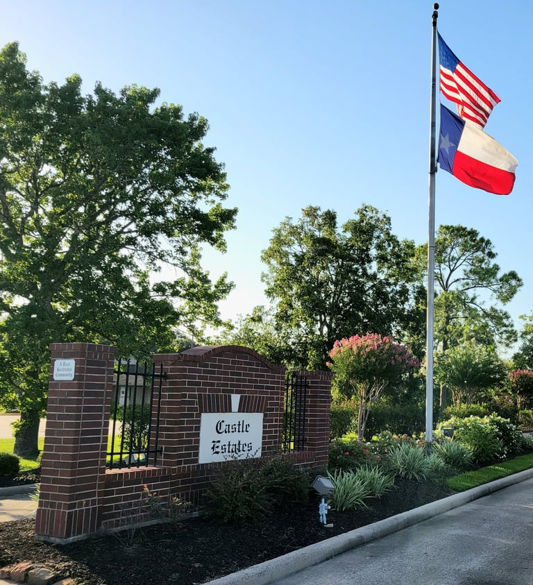 Castle Estates subdivision entrance sign and flags